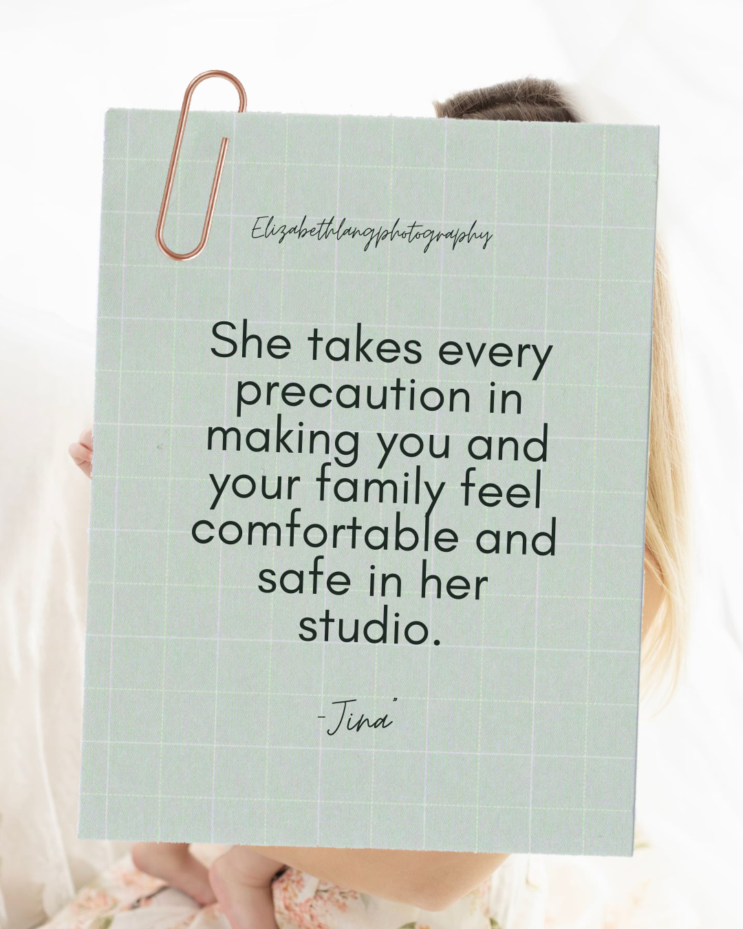 A mint green note card with a paperclip displays text about making clients feel comfortable and safe in a photography studio.