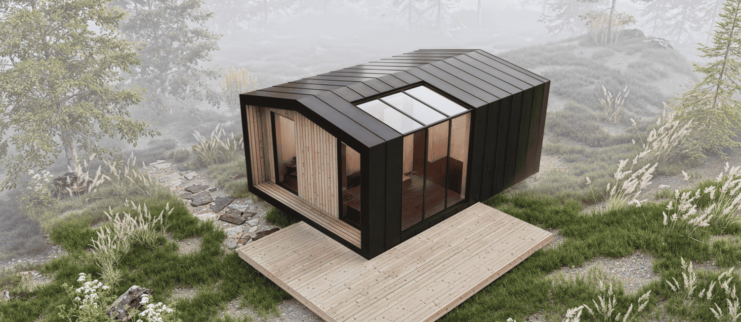 Modern cabin in natural setting features black wood cladding and expansive glass doors for seamless indoor-outdoor living.
