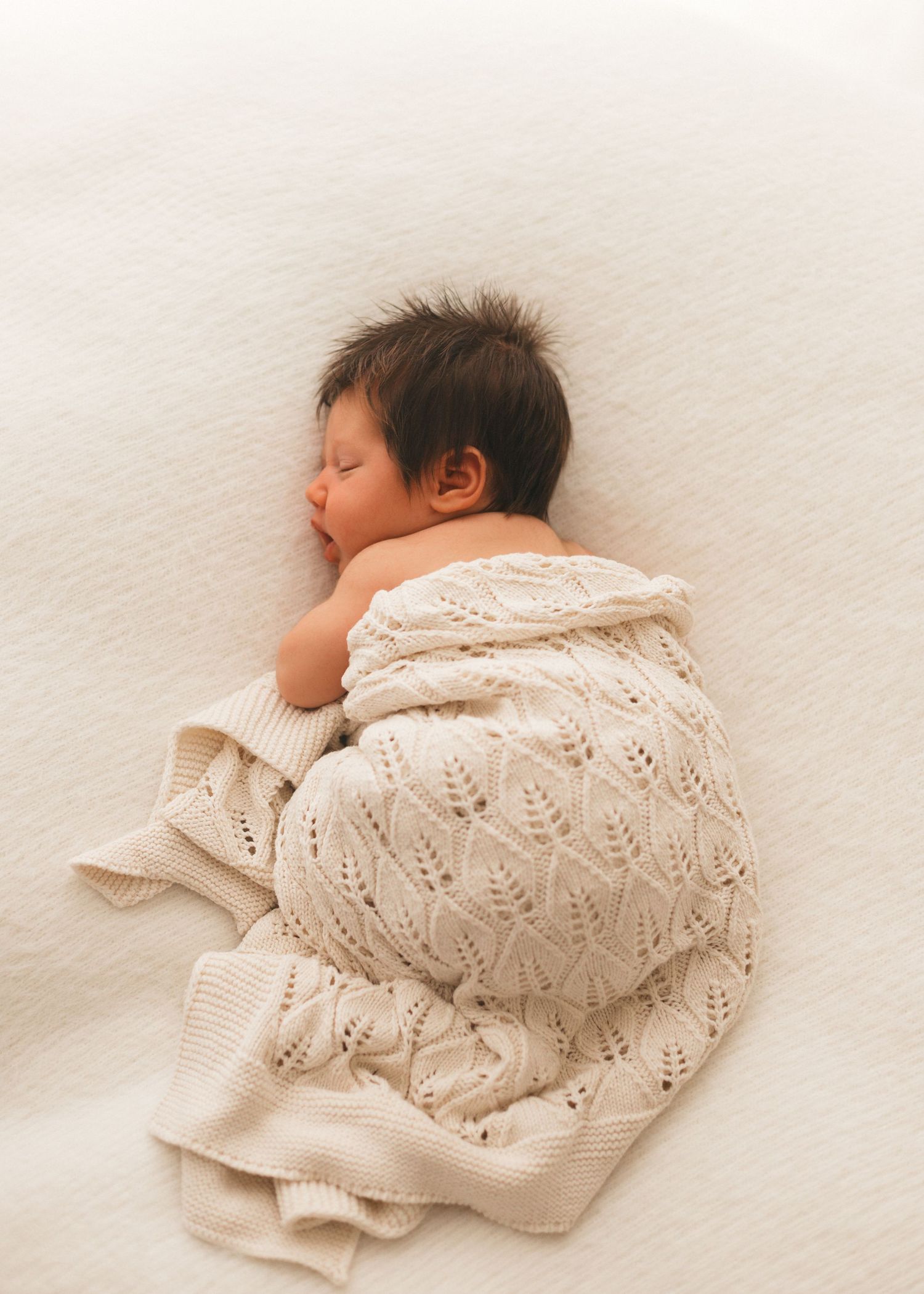 Timeless, natural newborn photography captured at home by Sarah Shaw Photography based in Stevenage, Hertfordshire