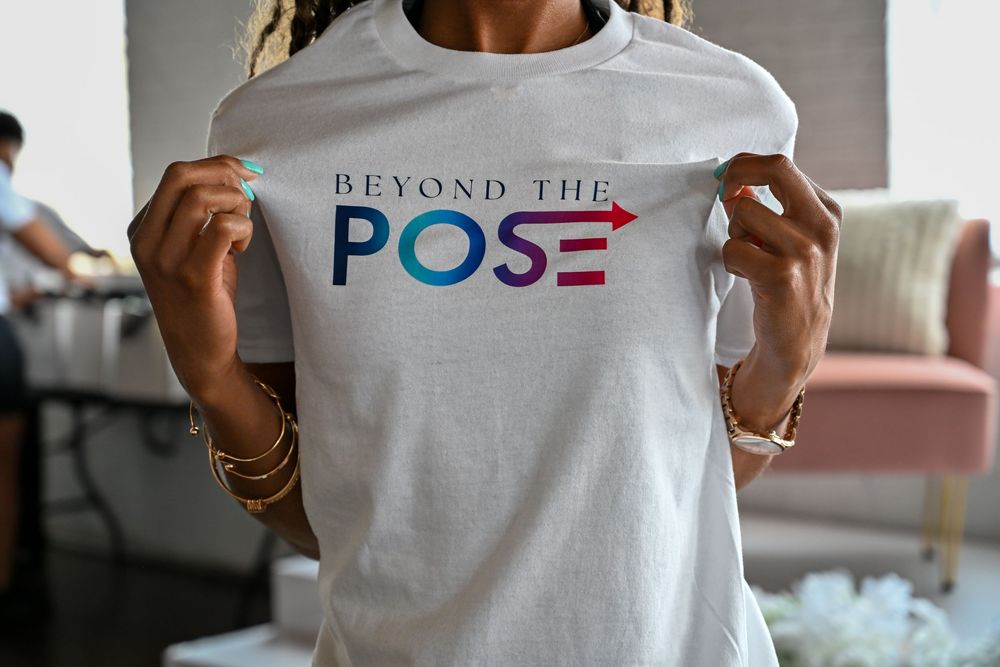 People wearing white t-shirts in a casual indoor setting display different styles and accessories.