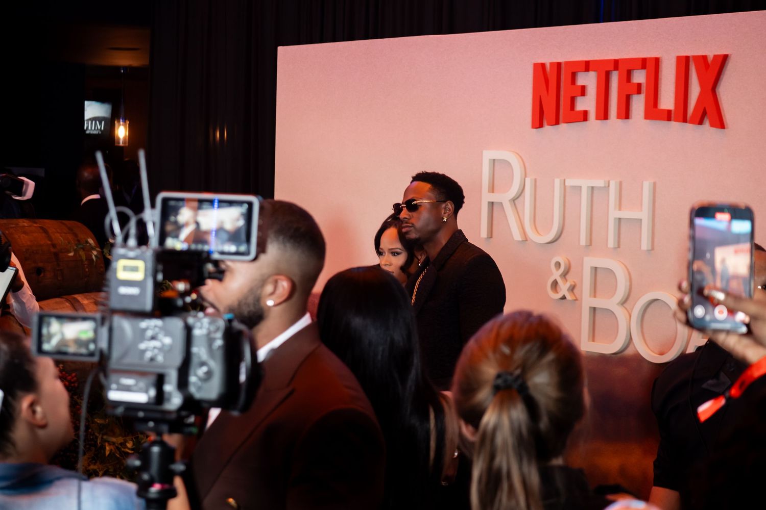 Netflix branded event space with professional lighting and signage visible.