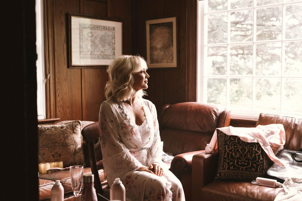 A series of six photos showing someone sitting in a wooden interior room with windows and papers on the wall.