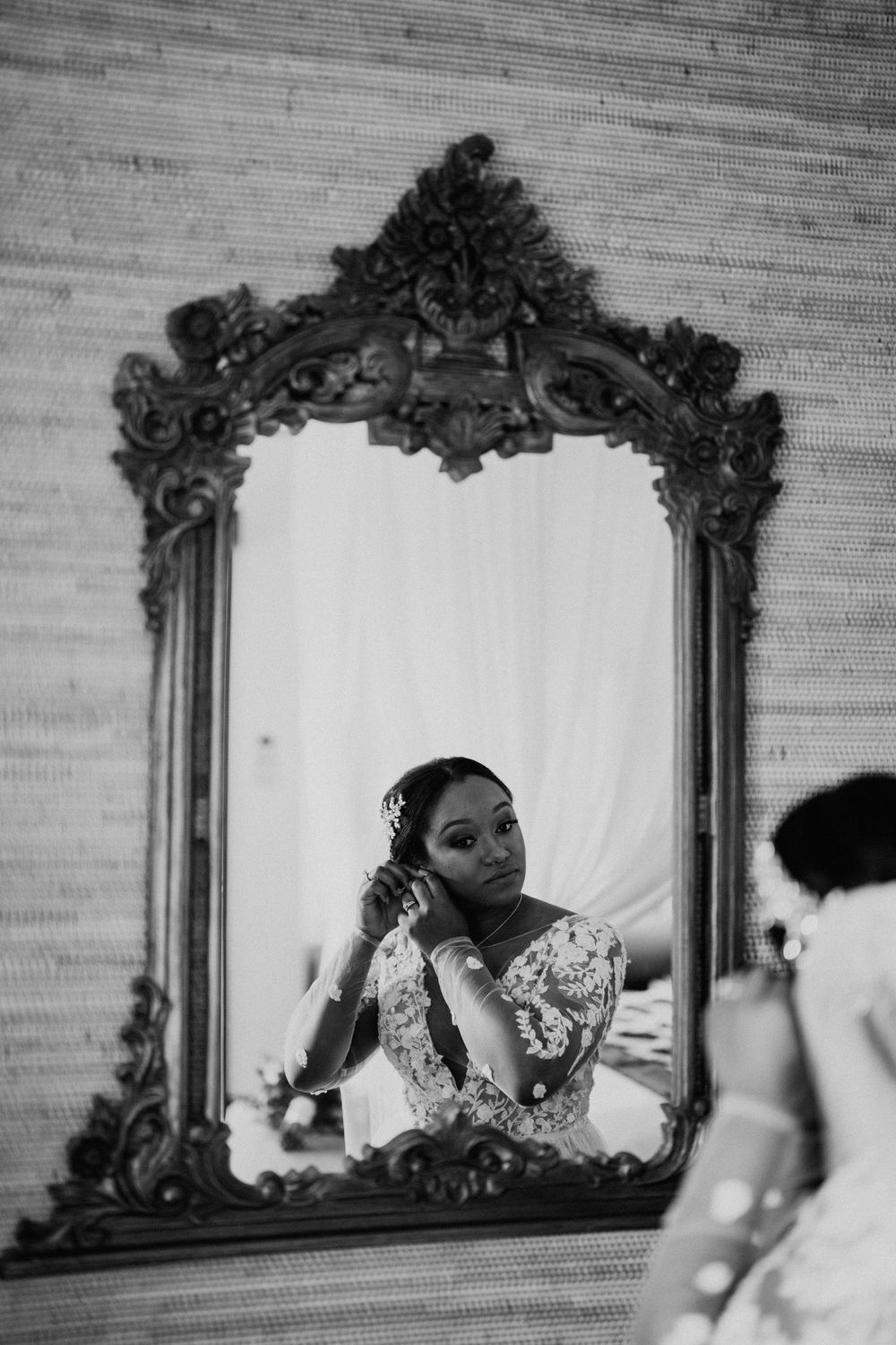 Artistic black and white photo sequence through ornate vintage mirror frame.