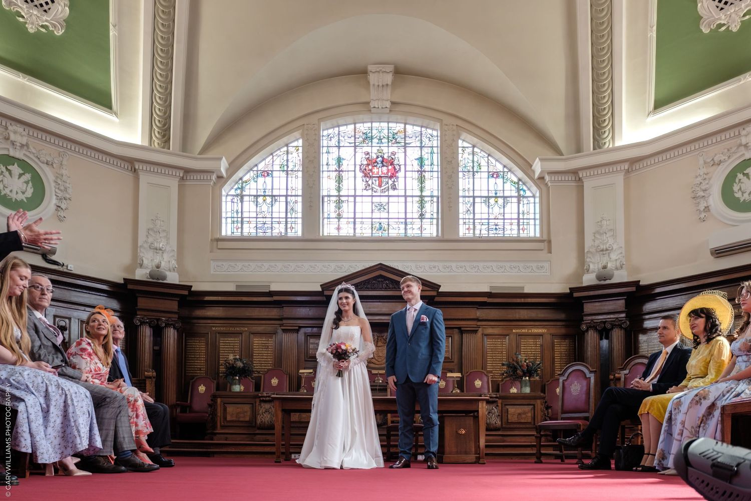 Multiple wedding ceremony photos show intimate moments between couple and guests in elegant church setting.