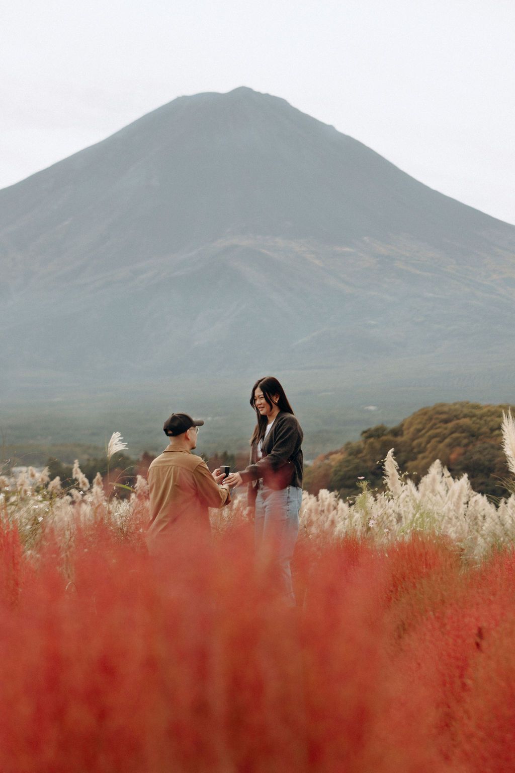 Surprise proposal and engagement photography at Lake Kawaguchiko Mount Fuji during Autumn