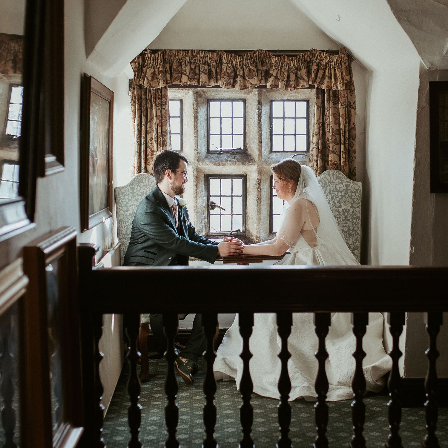 Romantic moment at a literary theme wedding at Holdsworth House Venue