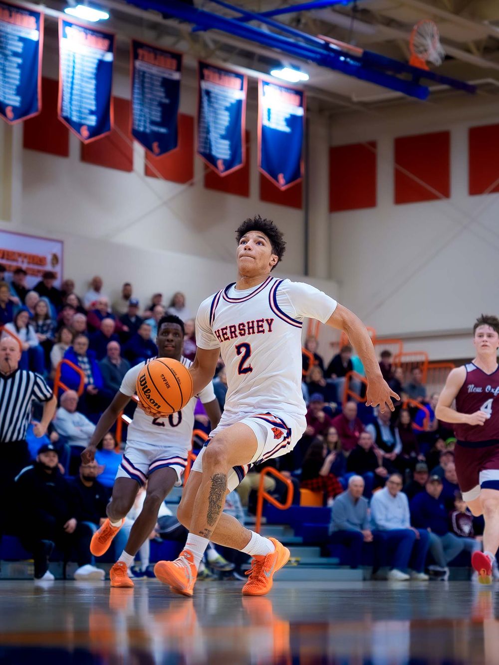 Hershey Trojans Cam Sweeney drives to dunk in the quarterfinals, by SportsFox Photography, Hershey
