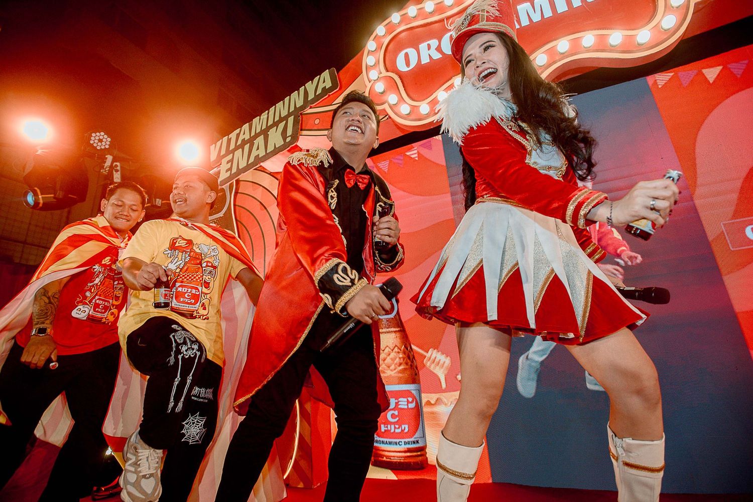 Red-themed sports celebration with fans in matching uniforms creating a vibrant atmosphere.
