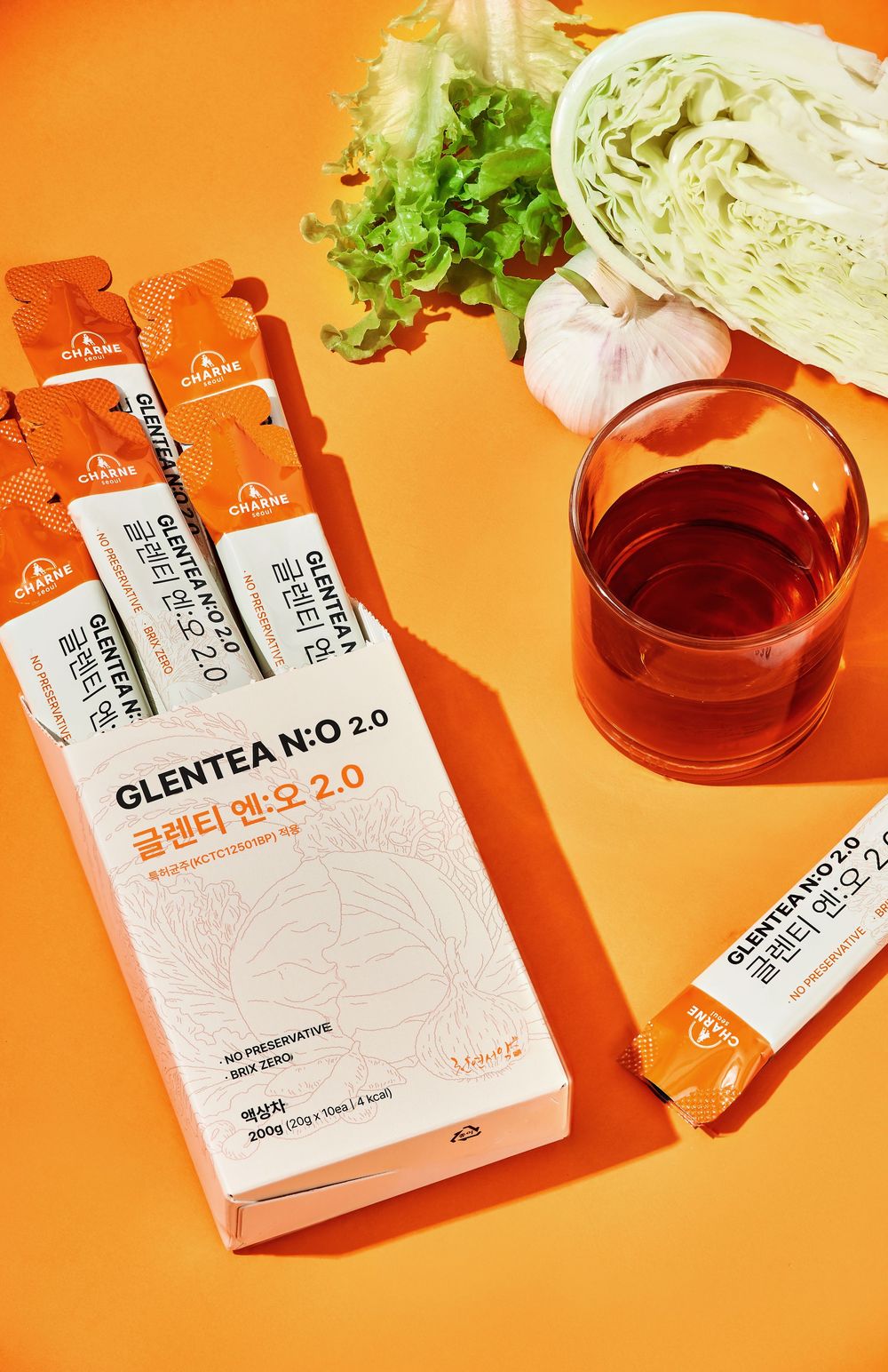 Chụp ảnh thực phẩm bổ sung collagen nền cam cùng nguyên liệu tự nhiên