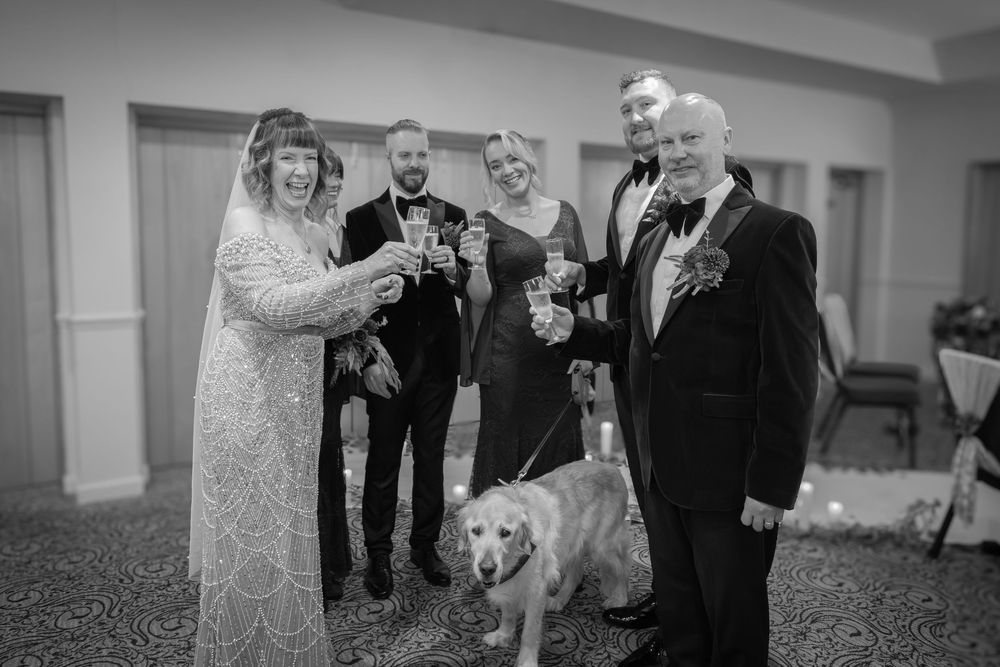 A collage of black and white wedding photos showing couples dancing and celebrating at an elegant indoor reception.