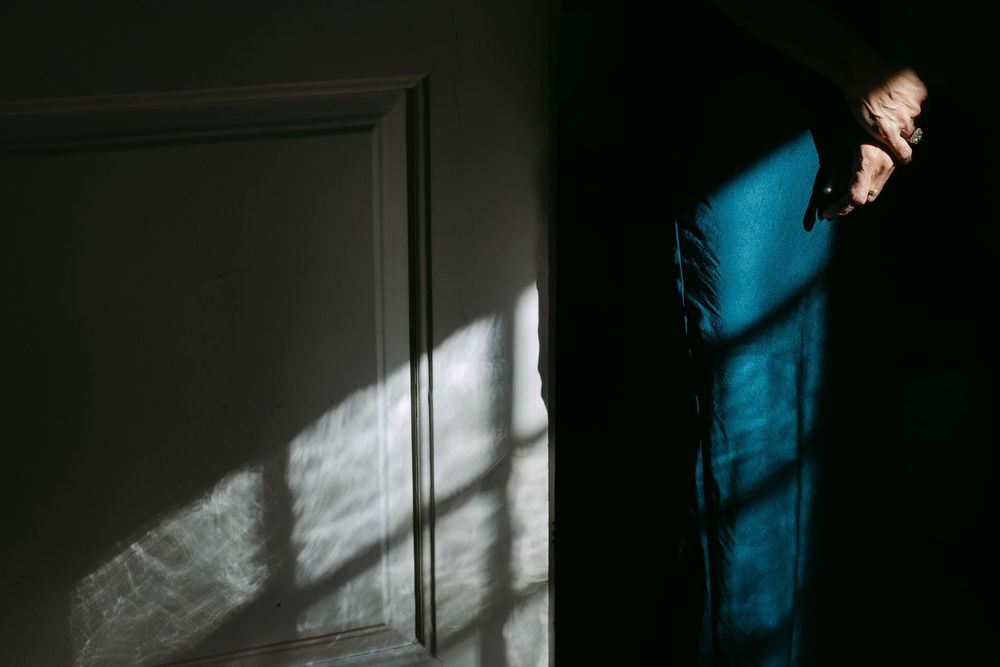 hands detail with a beautiful caravaggio light during a wedding destination in lisbon