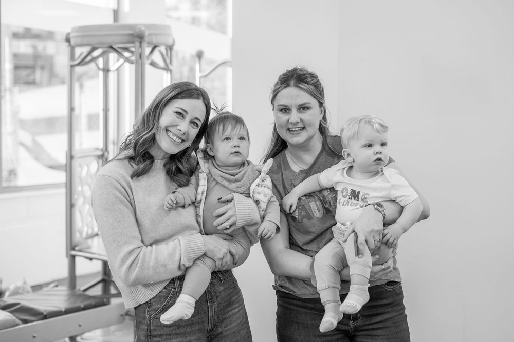 A series of candid black and white family photographs showing tender moments between parents and babies.