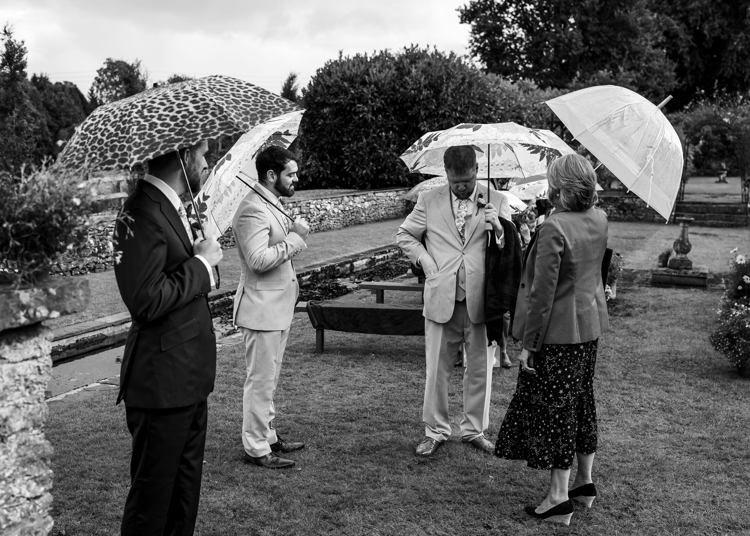 non-traditional wedding photographer in the Lake District - black and white grooms men ceremony