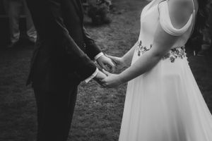 non-traditional wedding photographer in the Lake District - black and white holding hands