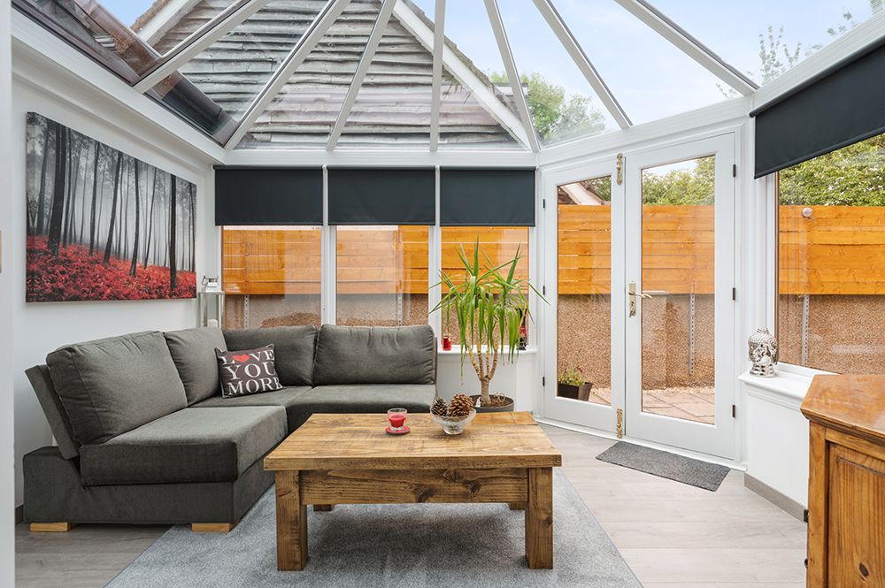 Large bright conservatory with south facing windows. Builder photography shoot