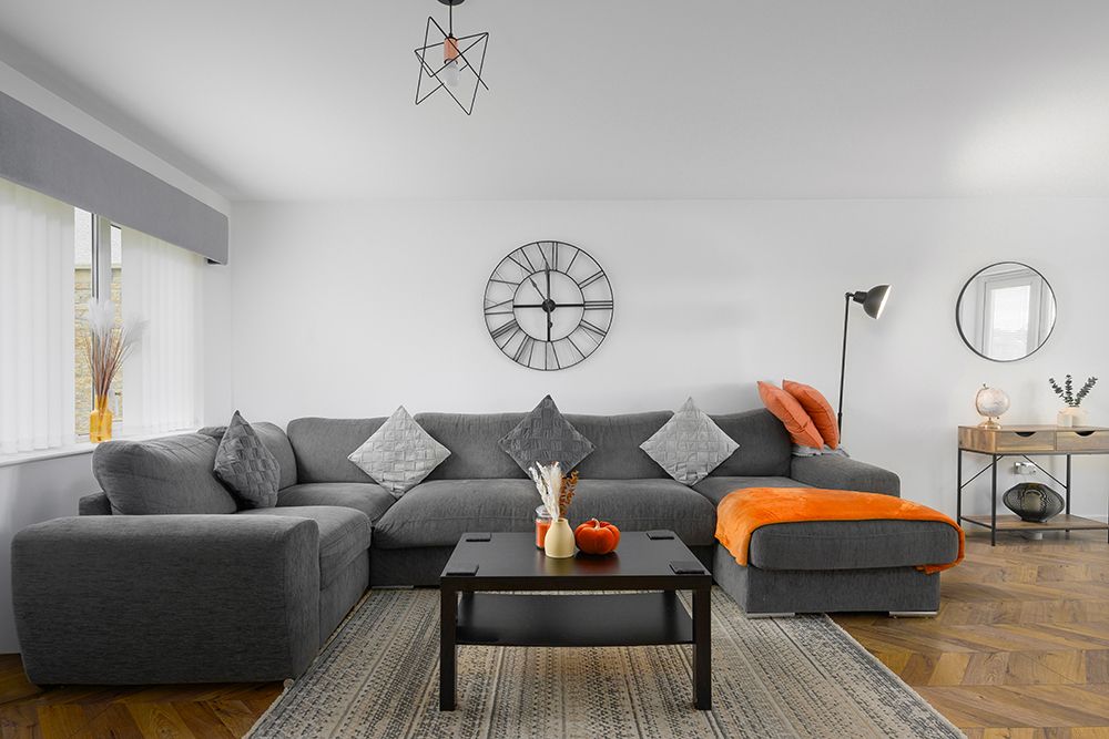 Large open plan lounge and dining room with large corner sofa. Photographed in Falkirk Scotland.
