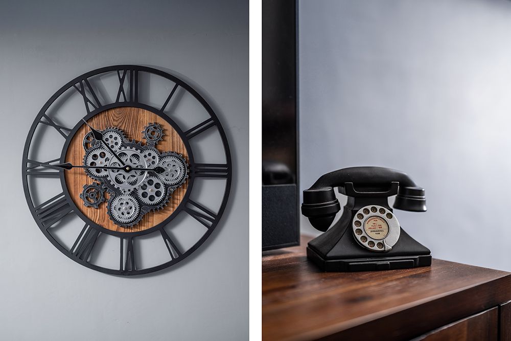 Lifestyle images for a homeowner in falkirk for property listing. clock with inner workings and old fashioned phone