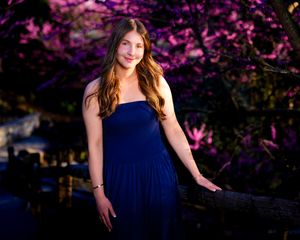 Hershey High School senior portrait session at night with purple flowering tree, by Deanna Fox, SportsFox Photography, Hershey PA
