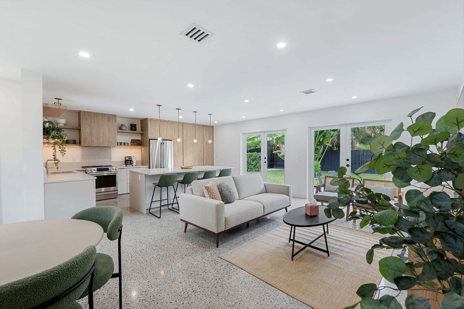 Real estate photography for this luxurious open-concept living and dining area in Boynton Beach Real estate photographer in Palm Beach