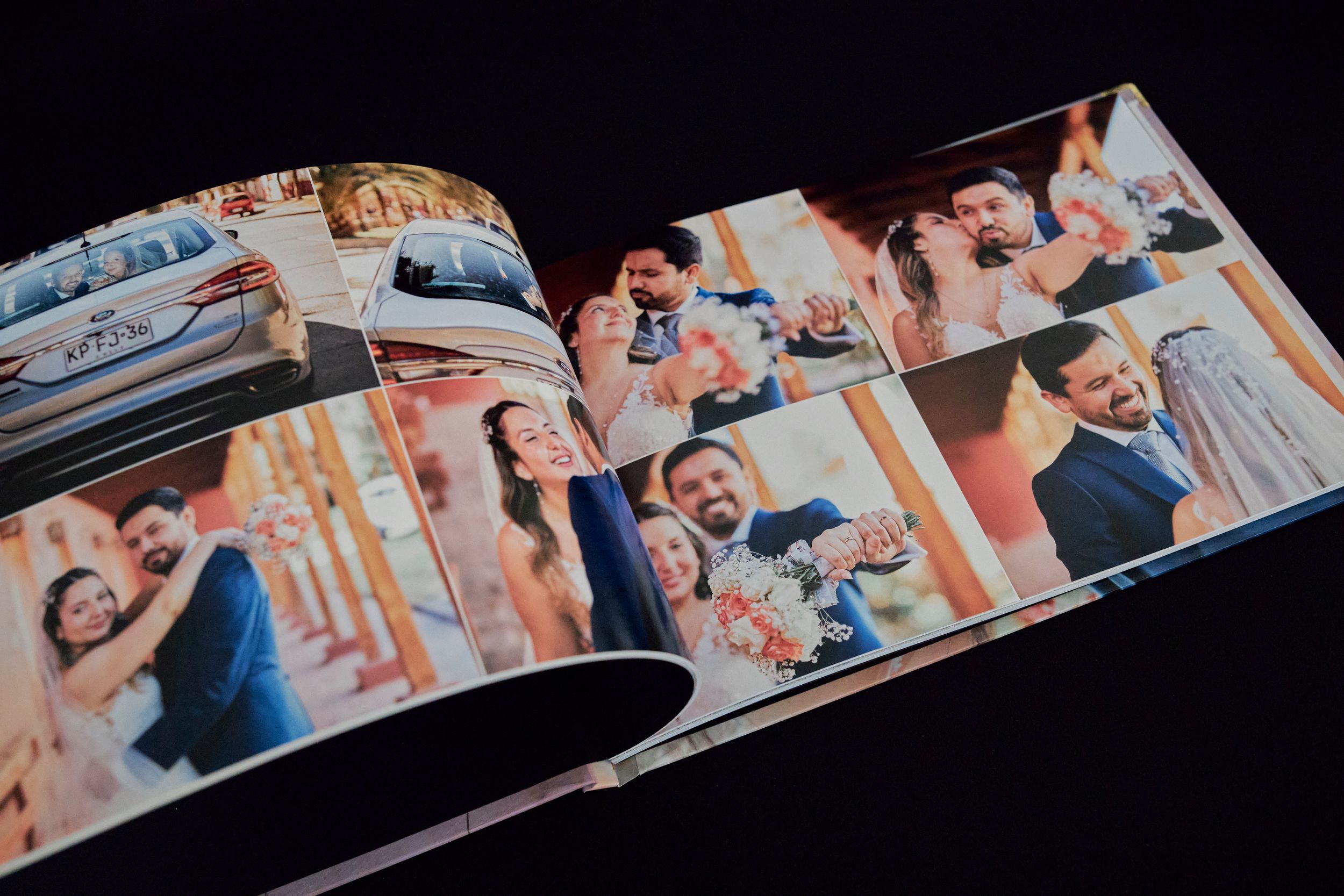 Open wedding album spread showing multiple candid celebration photos in warm tones.