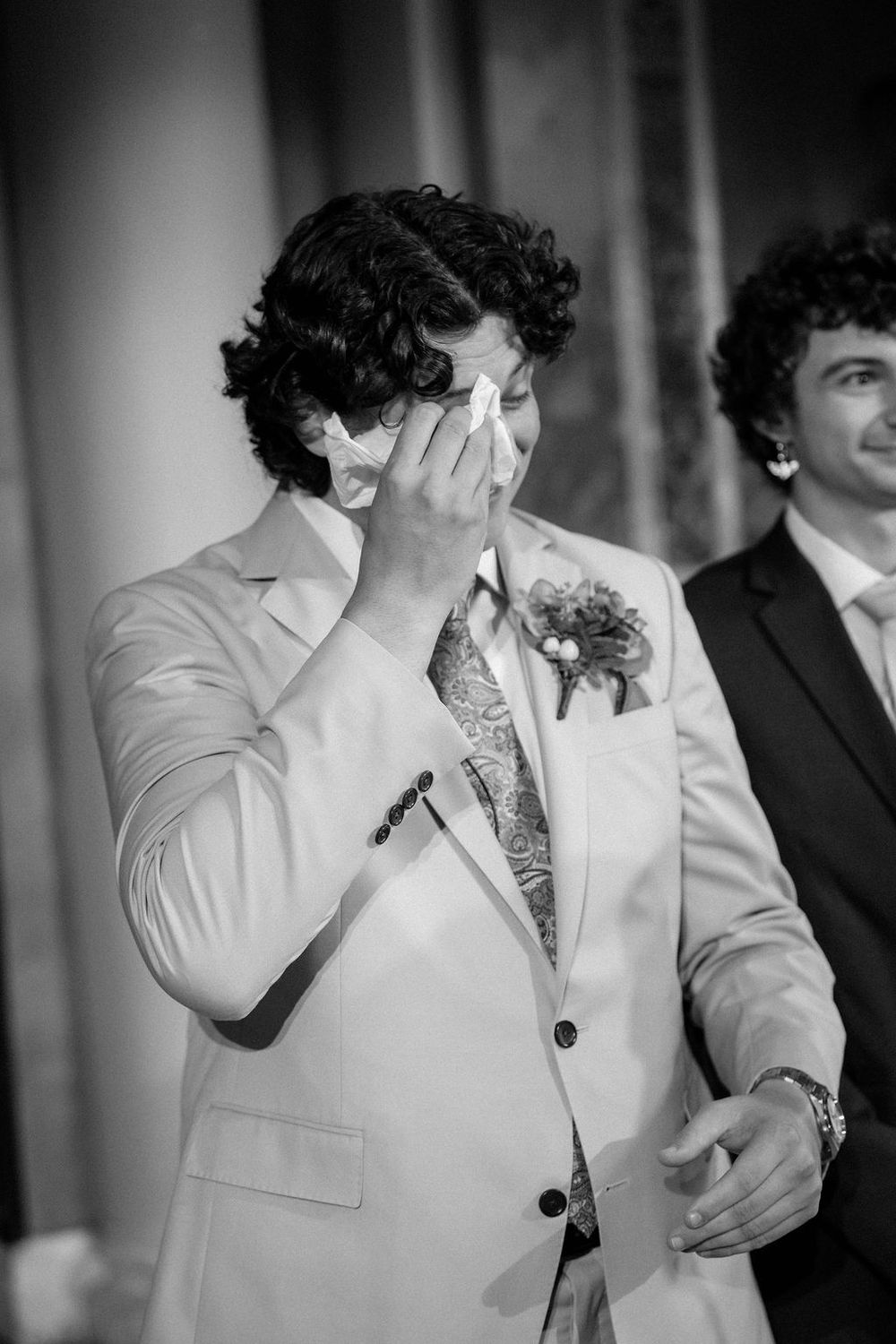 A black and white photo series showing emotional reactions during what appears to be a wedding ceremony.