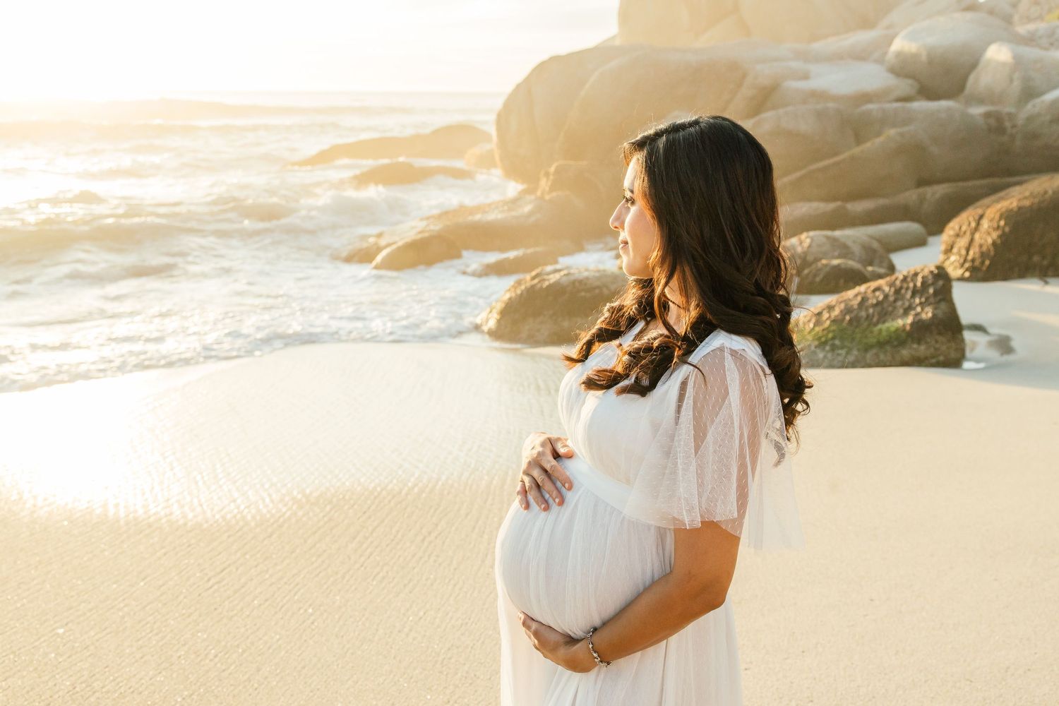 Cape Town Wedding and Engagement Photographer.Maternity shoot  at Clifton , Cape Town captured by Melissa Van Riel Photography