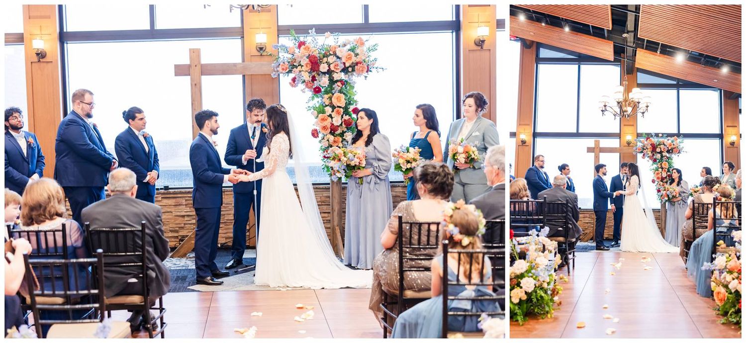 Wedding ceremony in a rustic indoor venue with wooden beams and floral decorations.