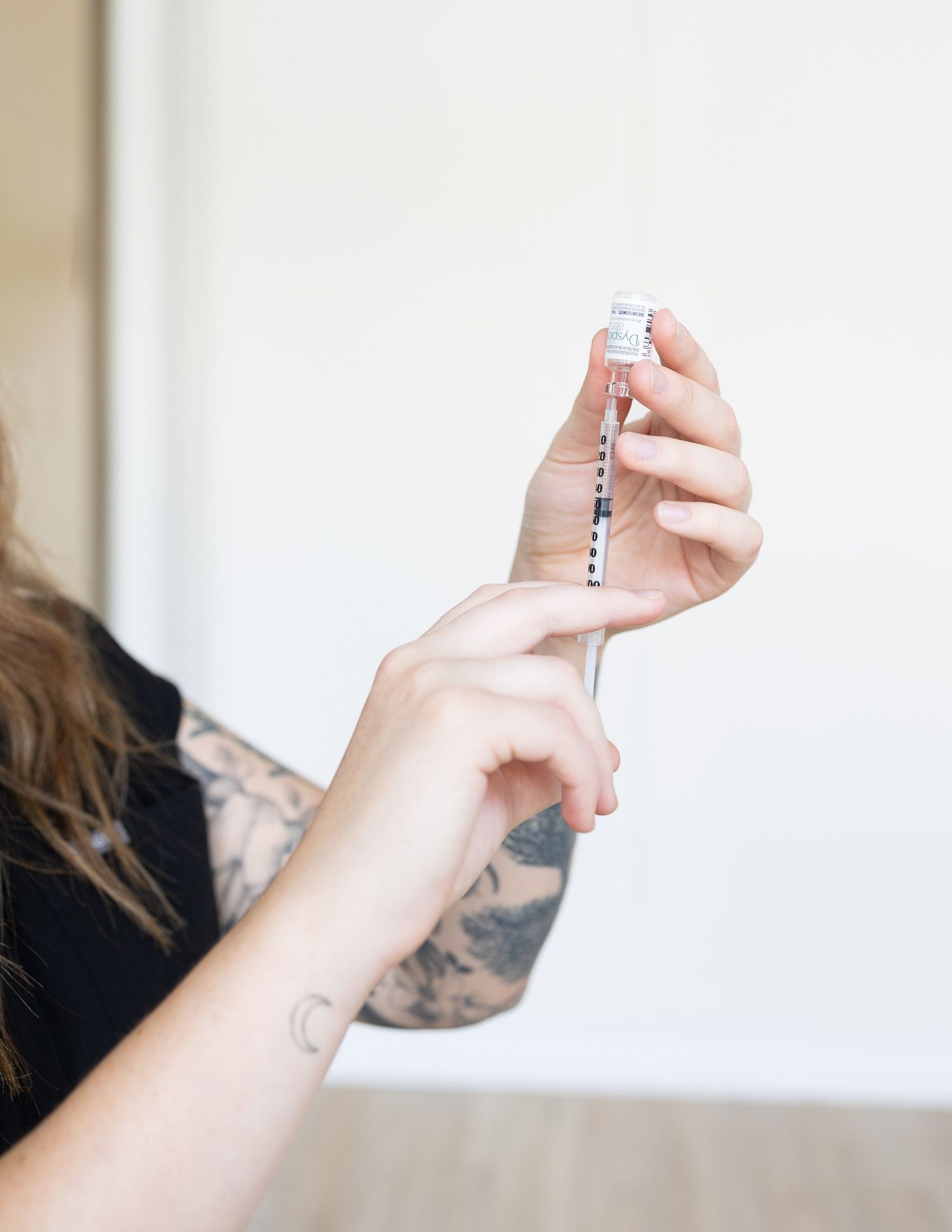 Nurse injector branding photoshoot, showing client pamphlets at parkhill studios in Cambridge.