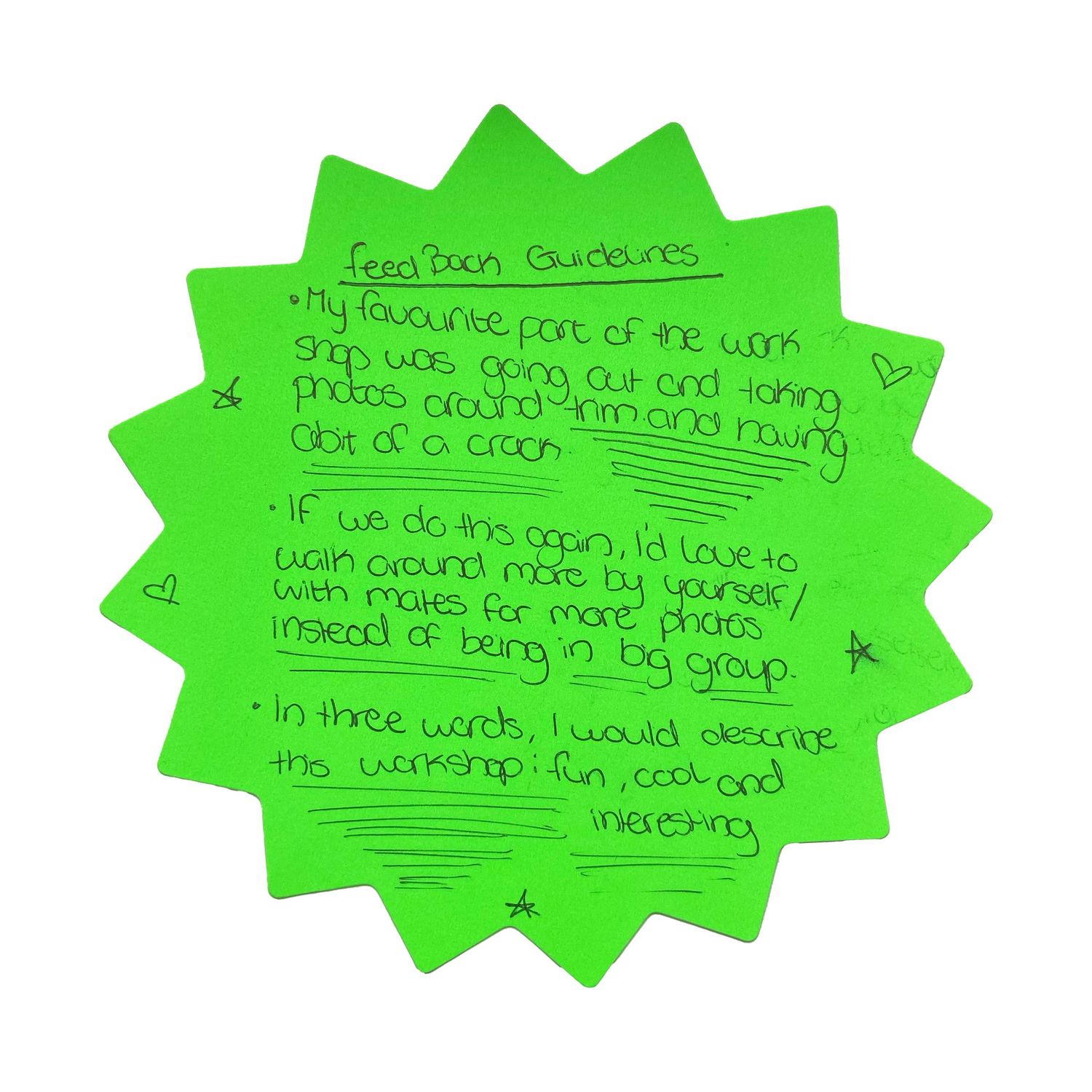 Green star-shaped sticky notes containing handwritten text arranged in a row.