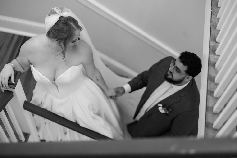 A series of black and white photos showing intimate dance poses between partners on a staircase.