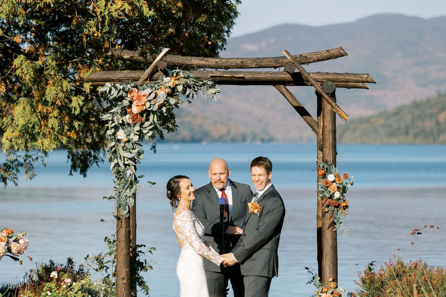 Black and white wedding photo collage showing candid moments of celebration and joy at an outdoor ceremony.