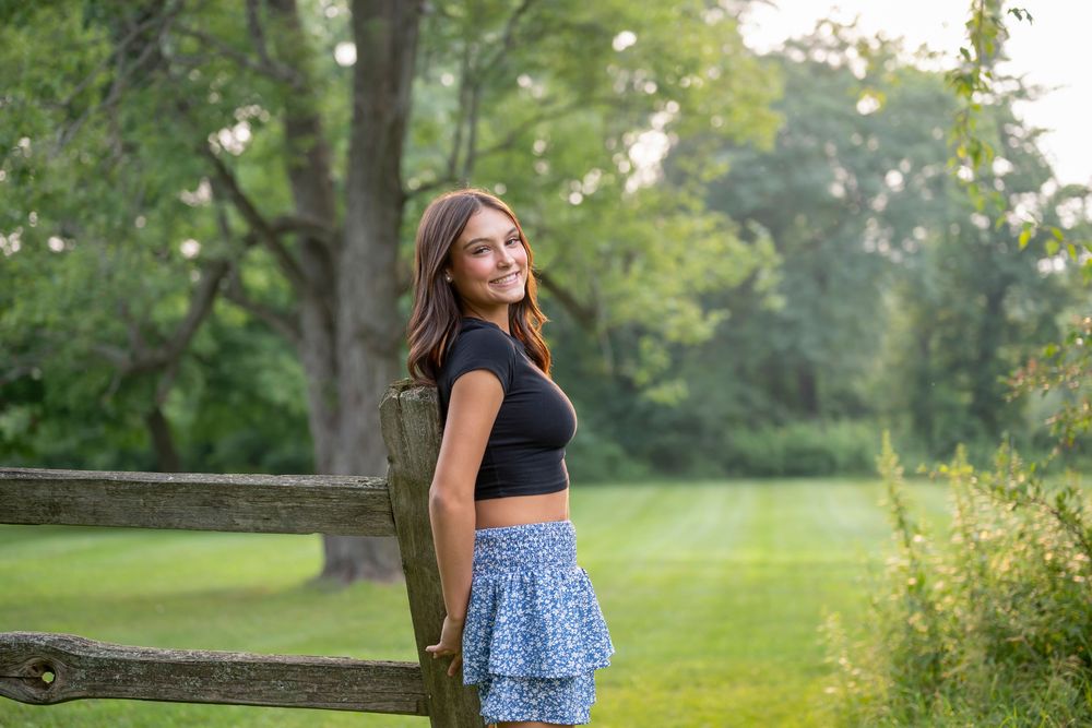 Summer outdoor portrait series in casual attire with natural lighting.