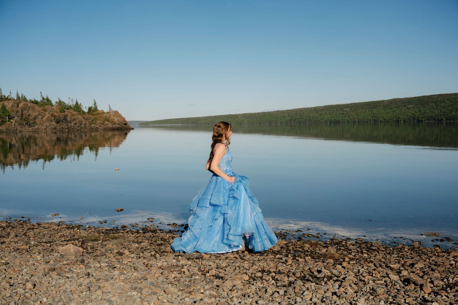 Girl walking in the trail in Gander