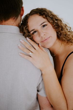 Romantic close-up portraits showing tender moments between couple.
