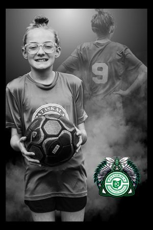 Black and white youth soccer portrait with player holding ball and team logo overlay in bottom corner.