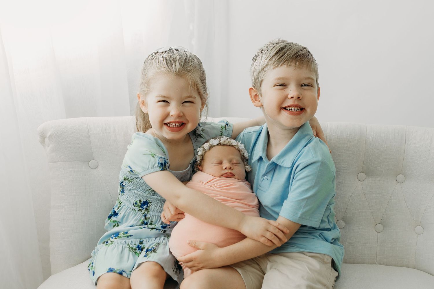 studio newborn photos with family in Tampa