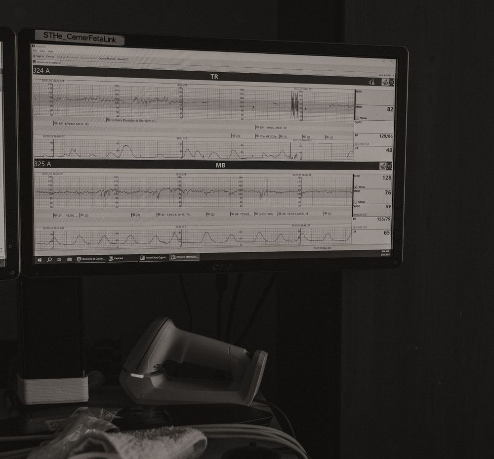 Hospital charts and medical documentation displayed on a dark background.