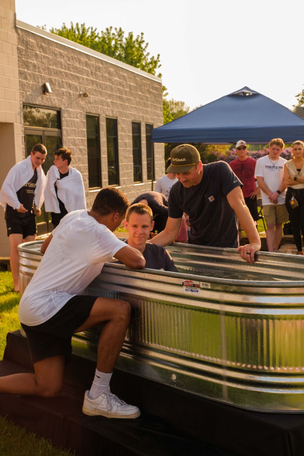 Baptism at an event called Mayfest at Artisan church in Blaine Minnesota