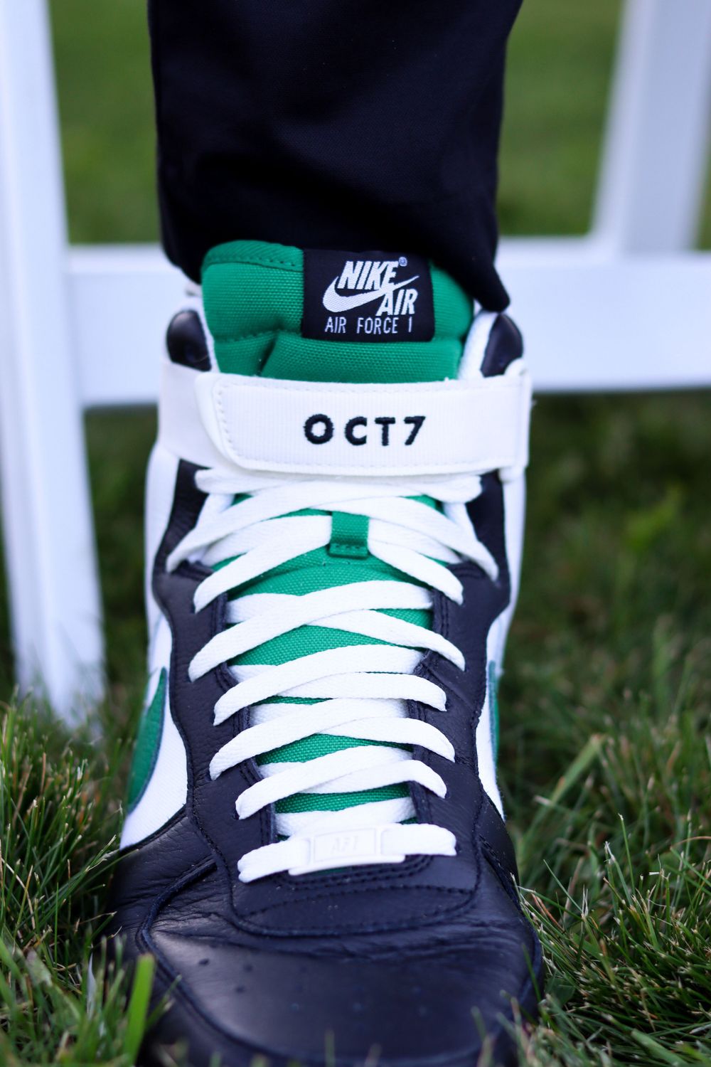 Nike Air high-top sneaker in navy and green with OCT7 custom detail.