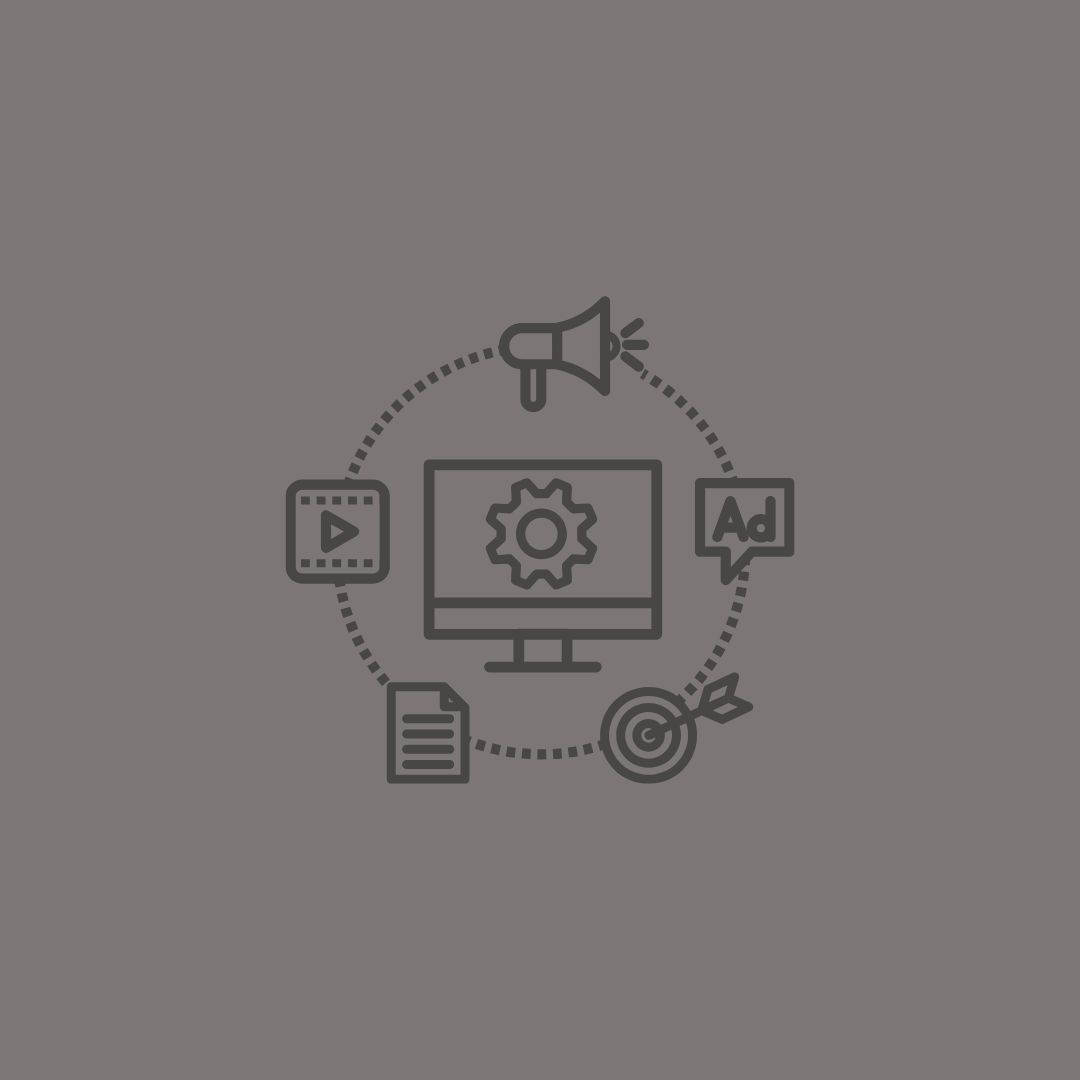Circular icon set showing computer monitor with settings gear surrounded by multimedia and document symbols.