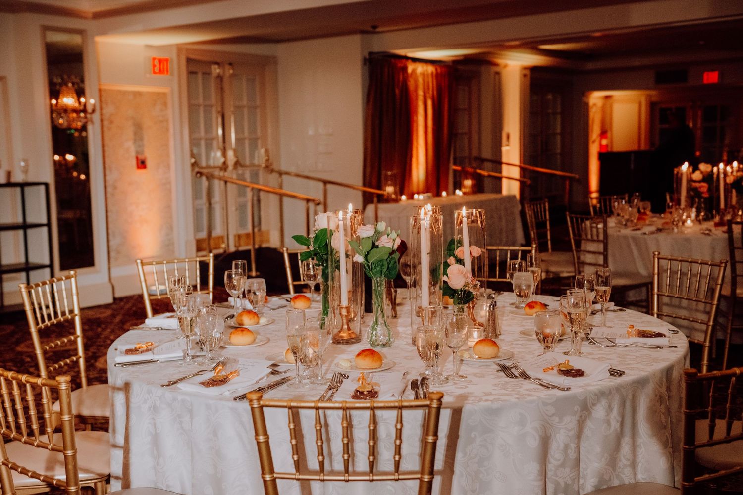 Wedding reception dancing at Olde Mill Inn ballroom in Basking Ridge NJ. Wedding reception table set up at Olde Mill Inn