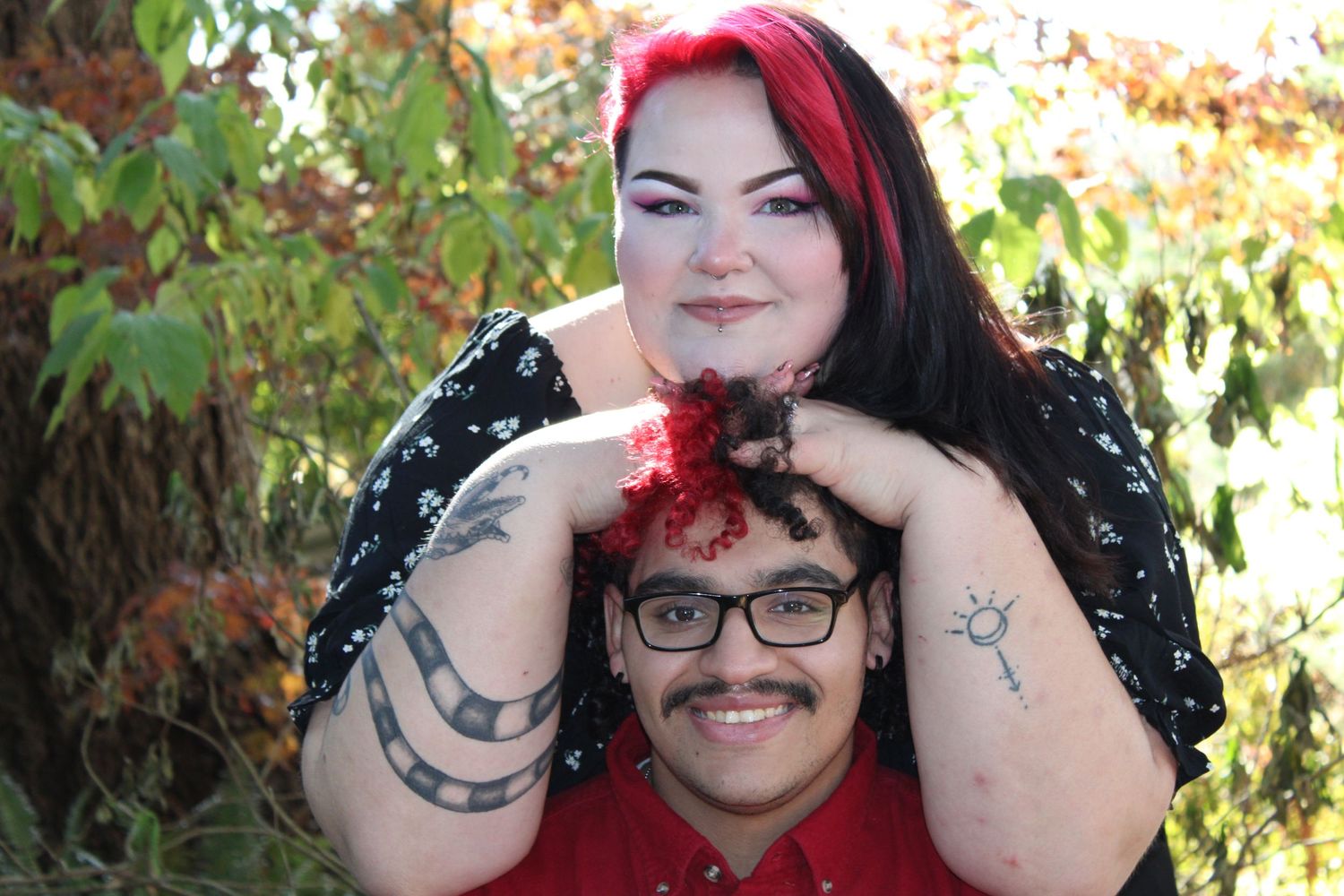 Playful couple portrait at Point Defiance Park in Tacoma, Washington, capturing connection and personality.