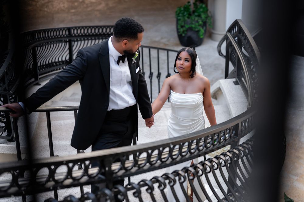 Couple walking through Worth Avenue archways in Palm Beach wedding session