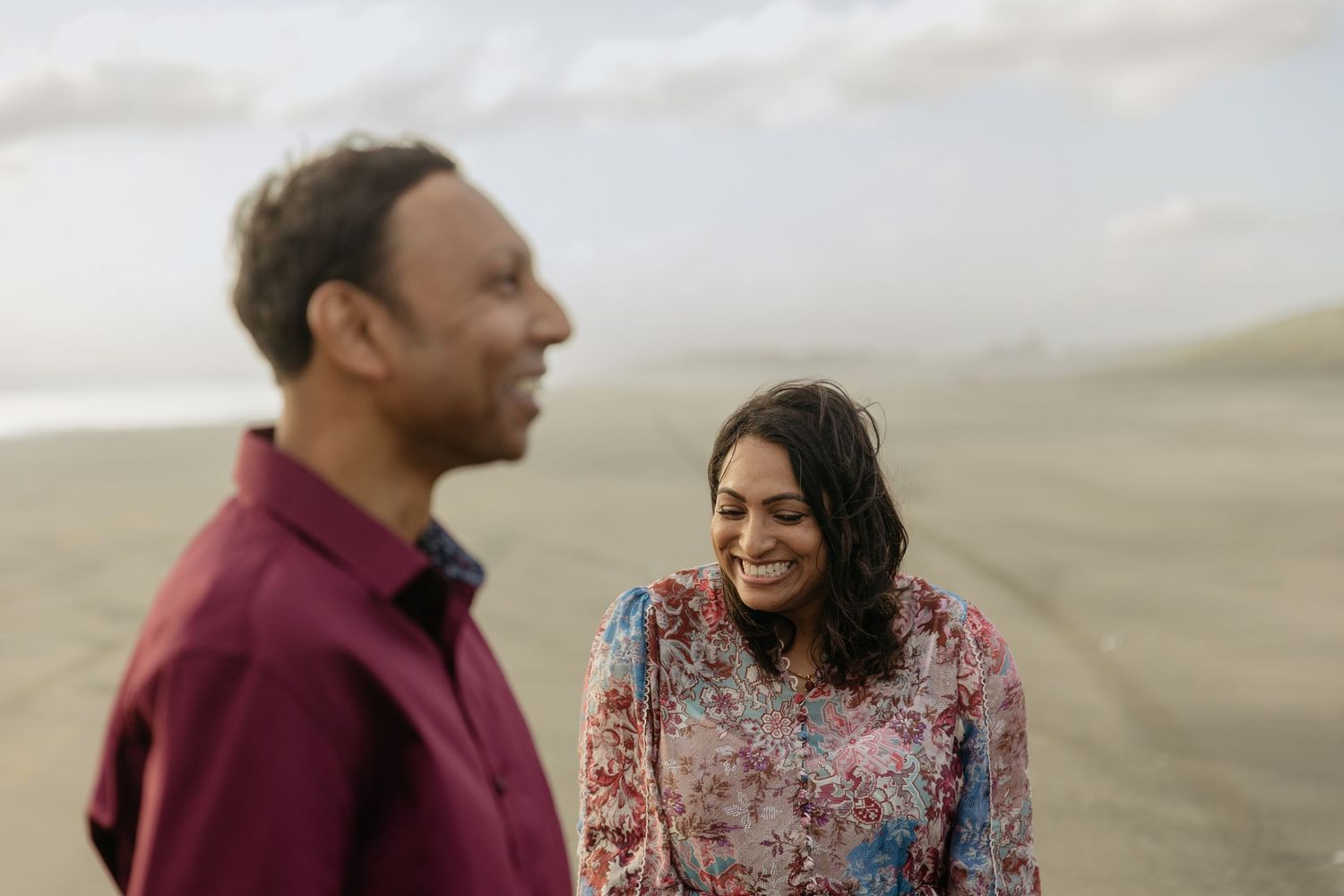 Sunset engagement couples photo shoot West Auckland beach