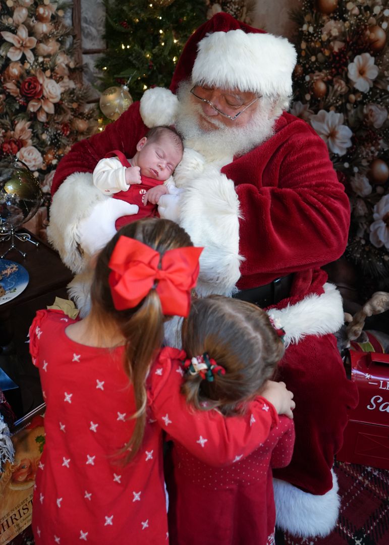 A festive holiday scene shows multiple moments of children visiting with Santa Claus in front of a decorated Christmas tree.