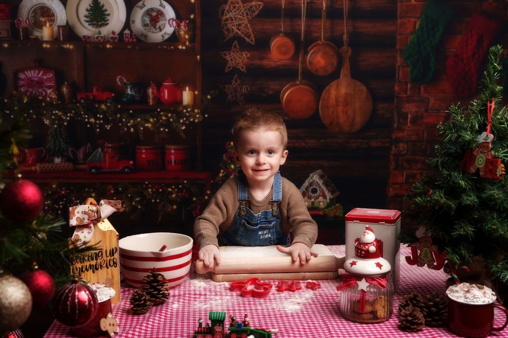 A festive holiday scene with a red and white checkered tablecloth, ornaments, and Christmas decorations in warm lighting.