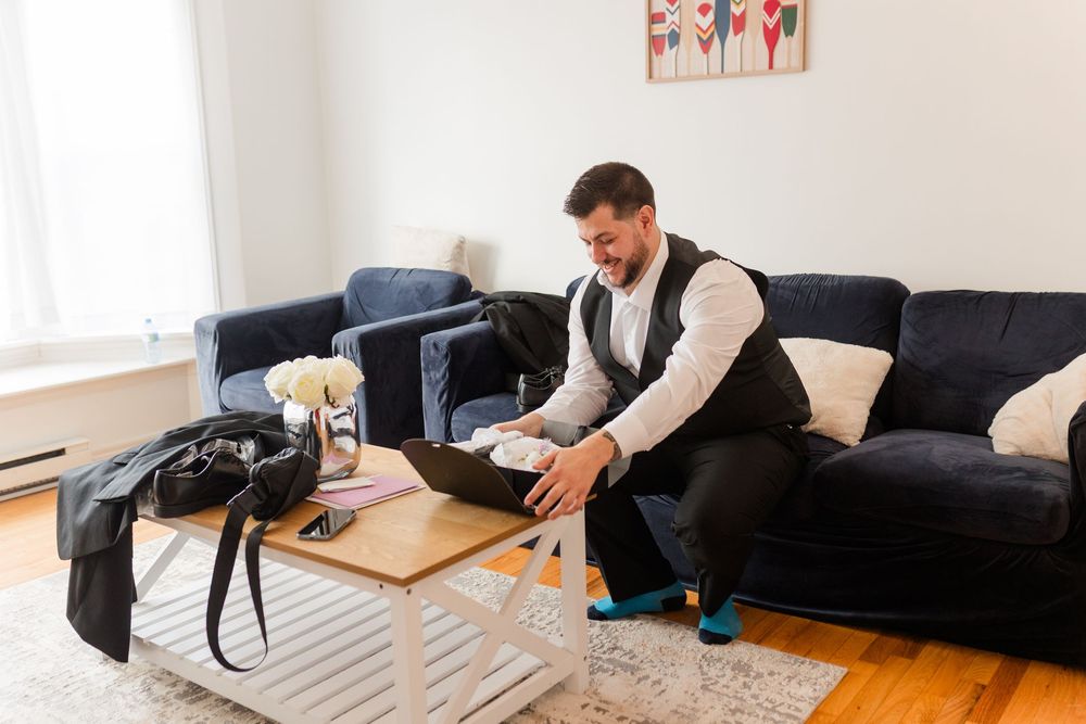 A series of connected photos showing a person resting on a black couch in different positions.