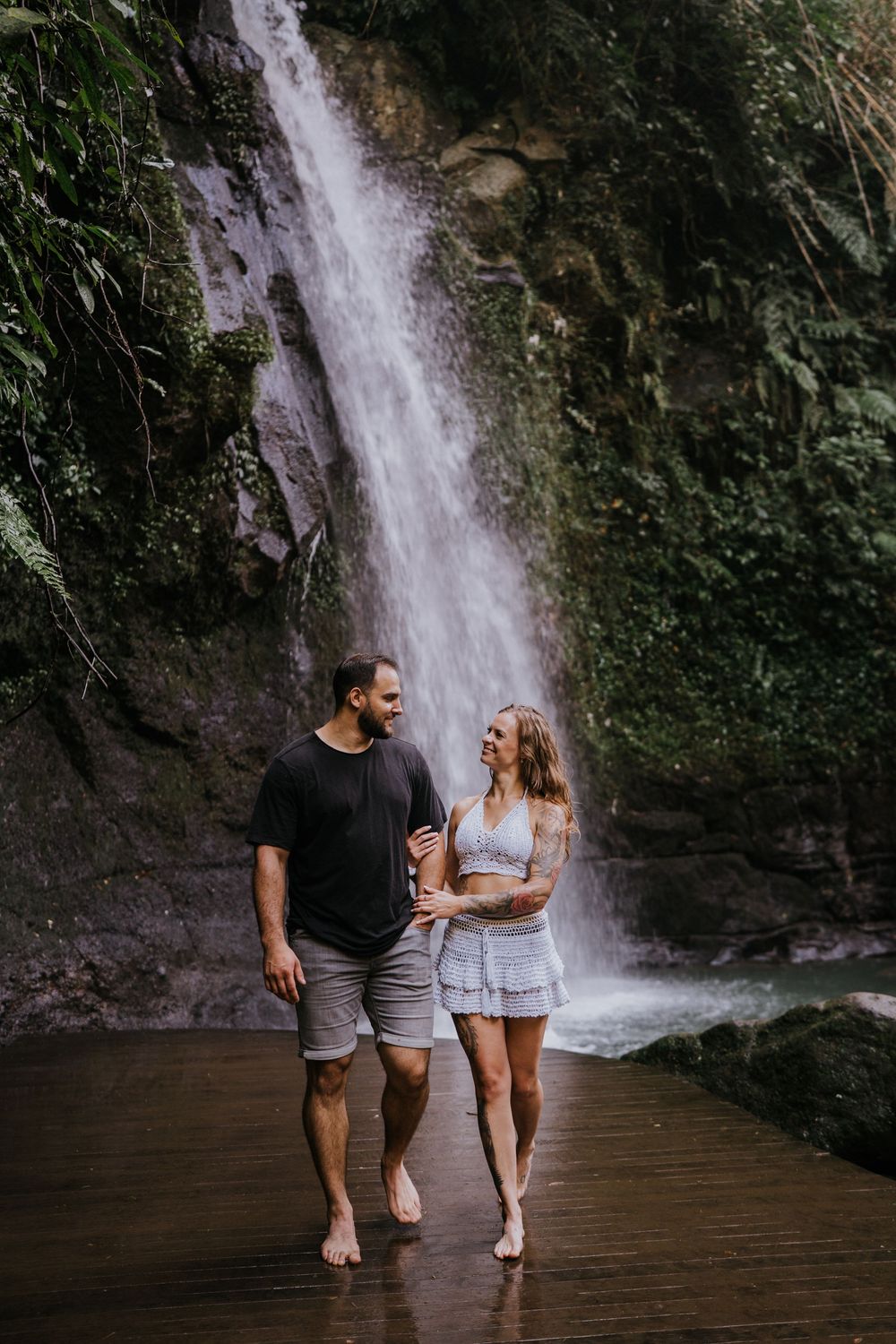 Bali couple photography services at Ulu Petanu Waterfall in Ubud.