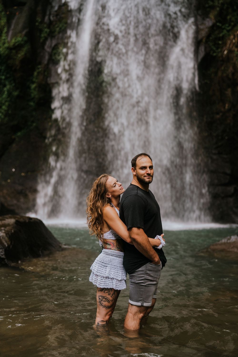 Bali couple photography services at Ulu Petanu Waterfall in Ubud.