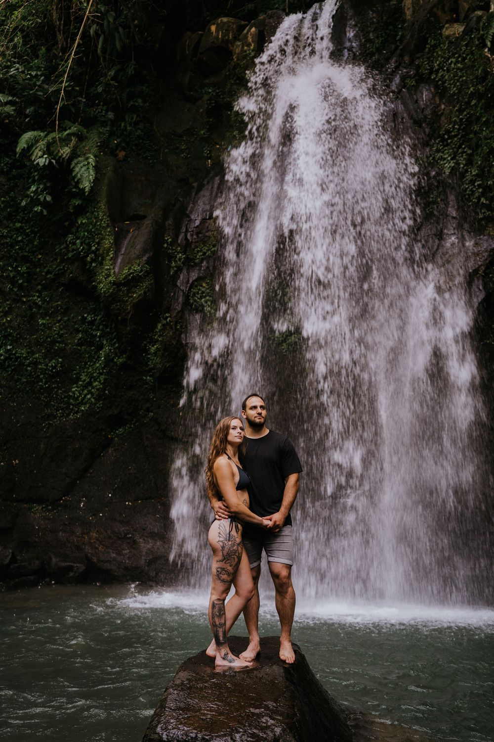 Bali couple photography services at Ulu Petanu Waterfall in Ubud.